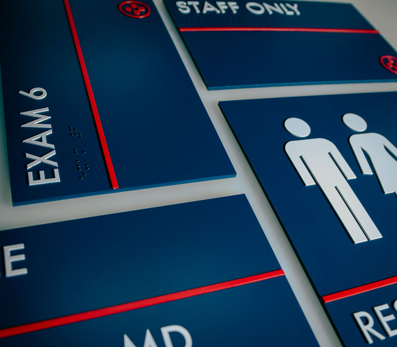 close up of room signs laid in a grid pattern