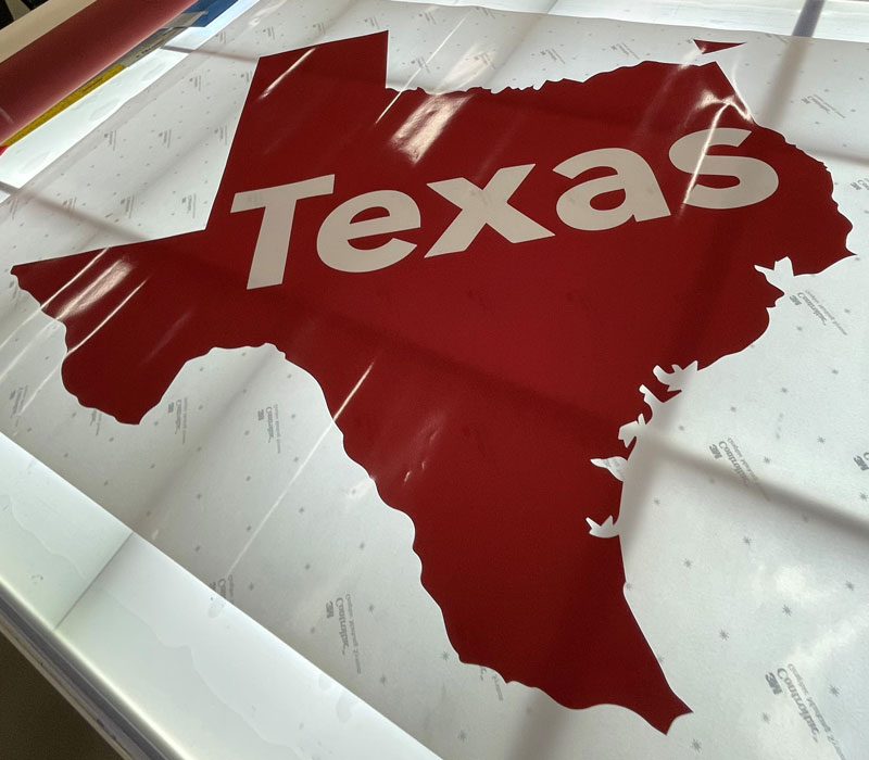 large vinyl sticker of Texas after being cut out