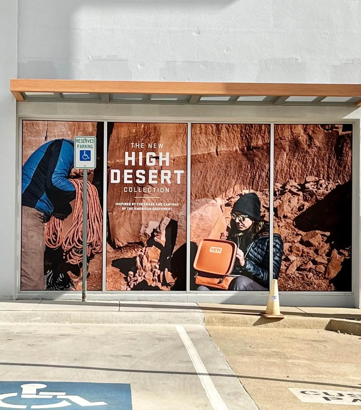 An outdoor window sign for "The New High Desert Collection" from Yeti
