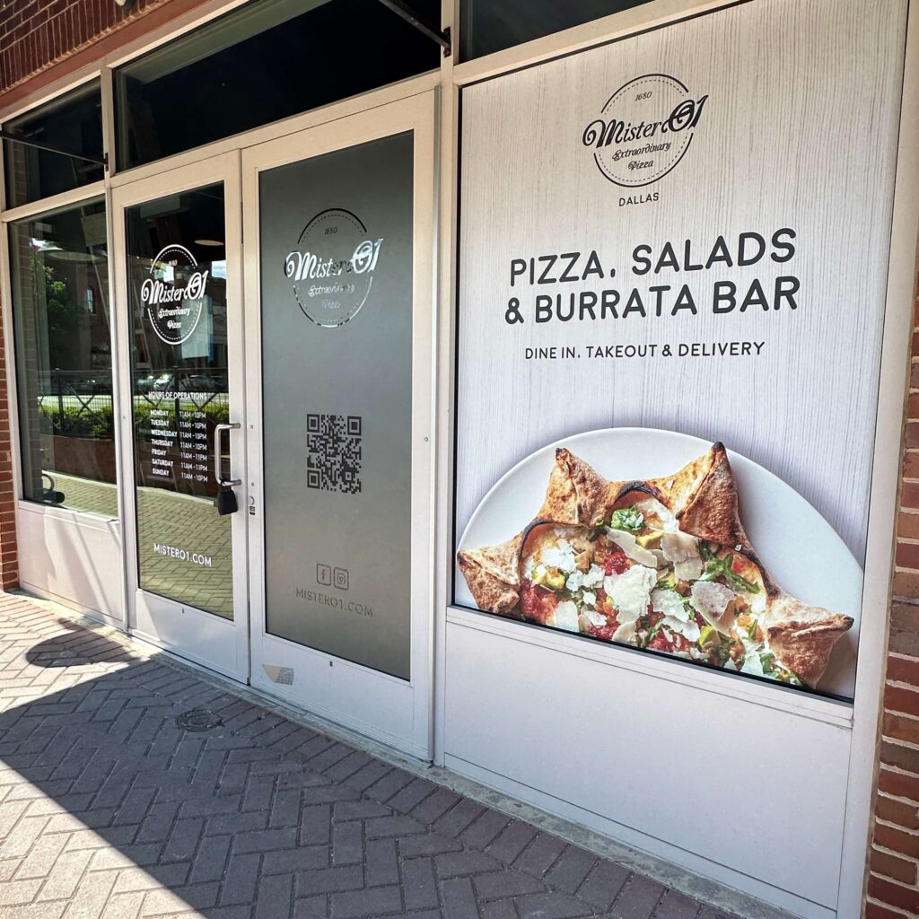 An exterior window mural for a pizza restaurant that reads "PIZZA, SALADS & BURRATA BAR"