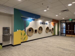 Check in wall graphics with dimensional letters