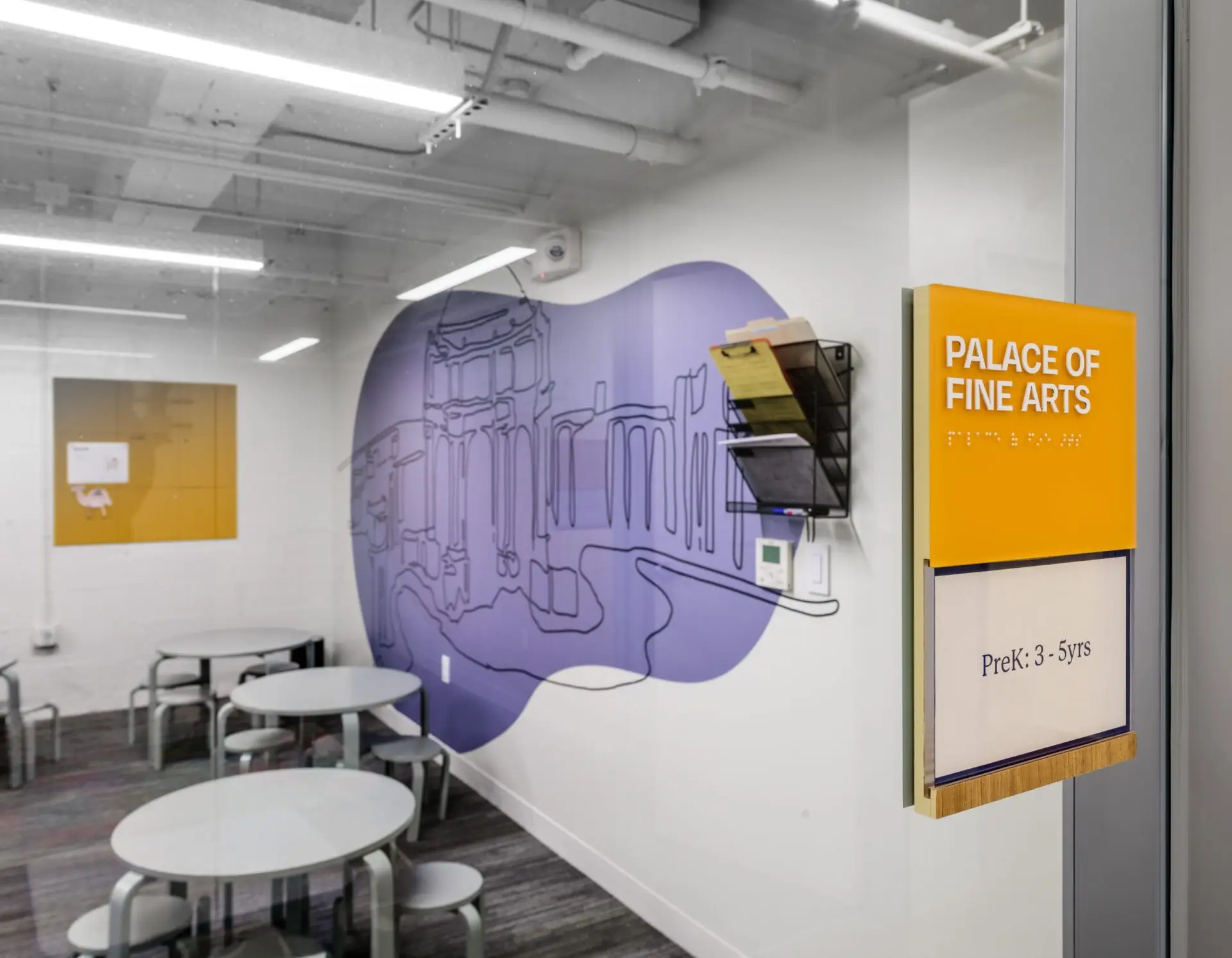 Church classroom with ADA sign and wall graphics